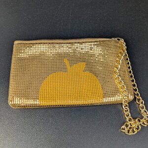DKNY Gold apple metal sequence wristlet clutch